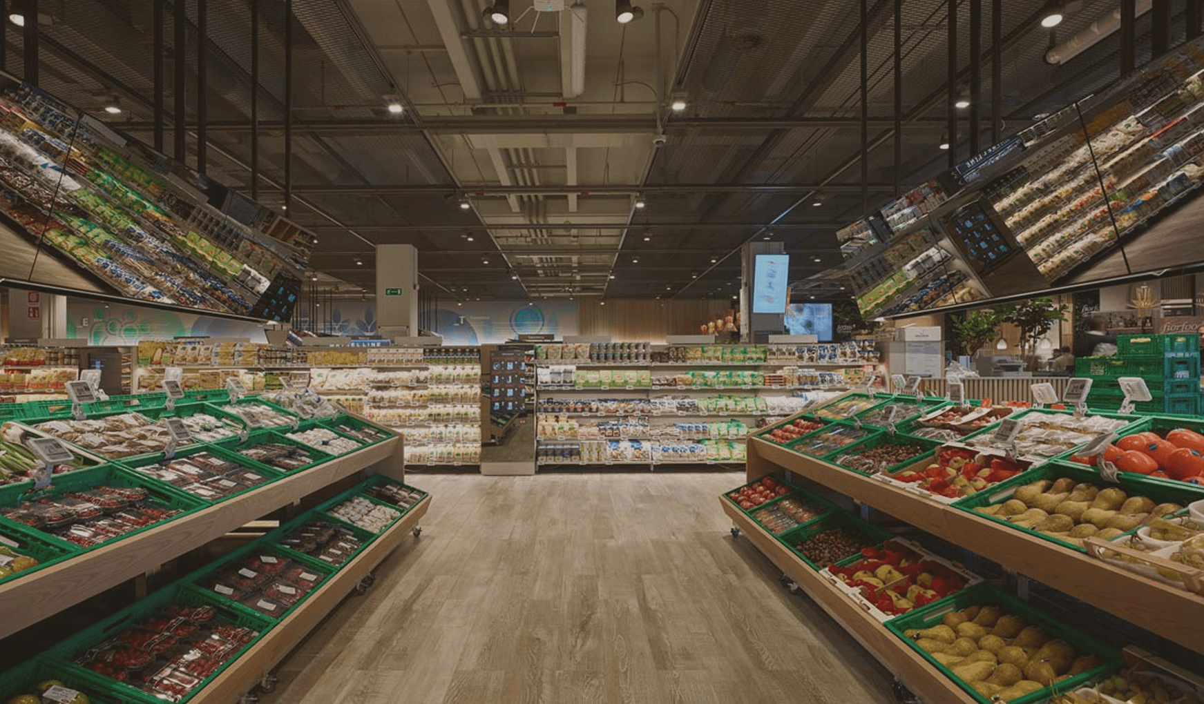 Grocery store aisle with fresh produce shelves